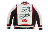 SURE “RUNNING WOMAN” KNIT SWEATER