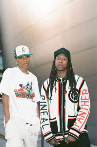 SURE “RUNNING WOMAN” KNIT SWEATER